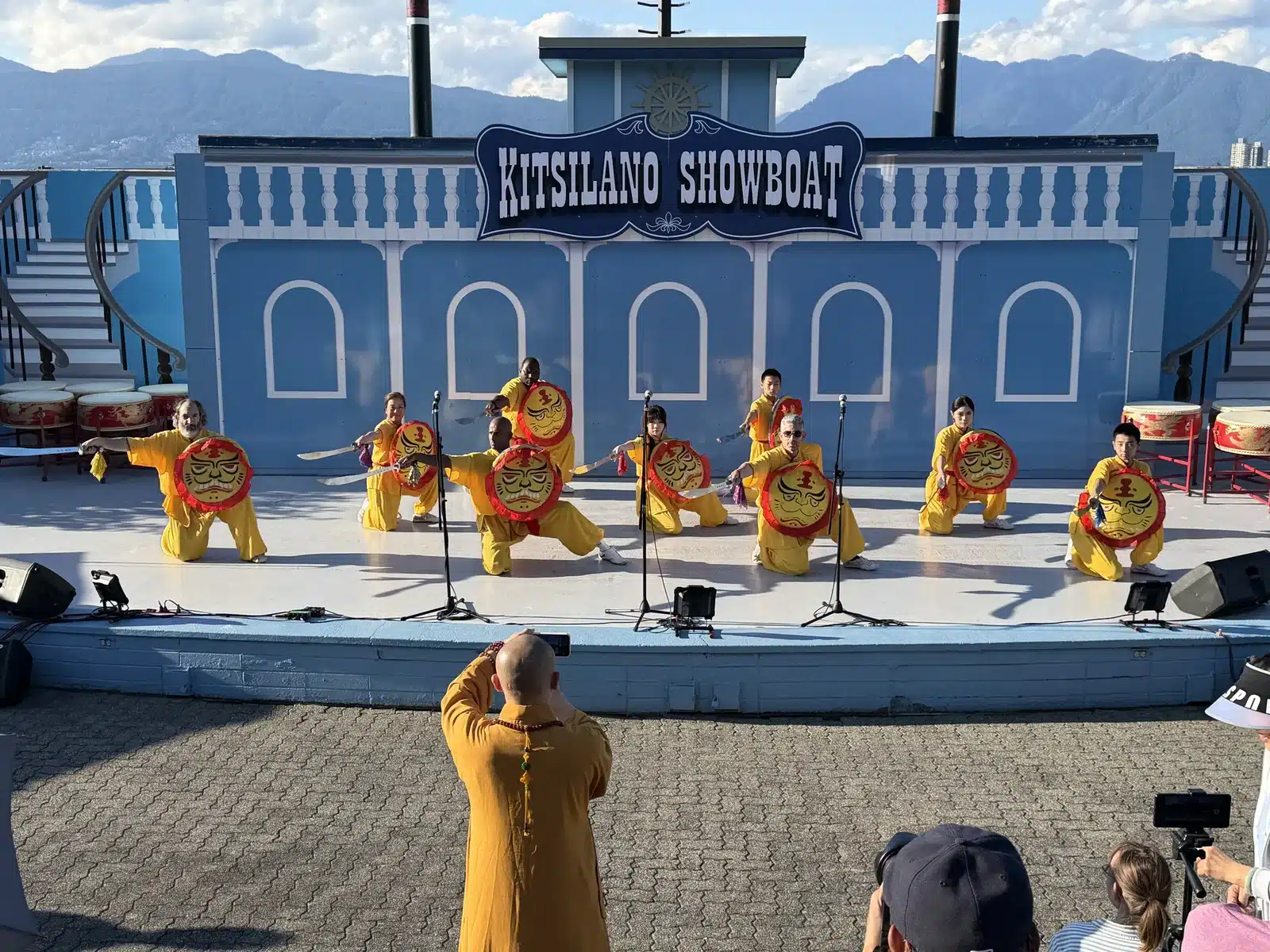 Kung Fu team performing with weapons
