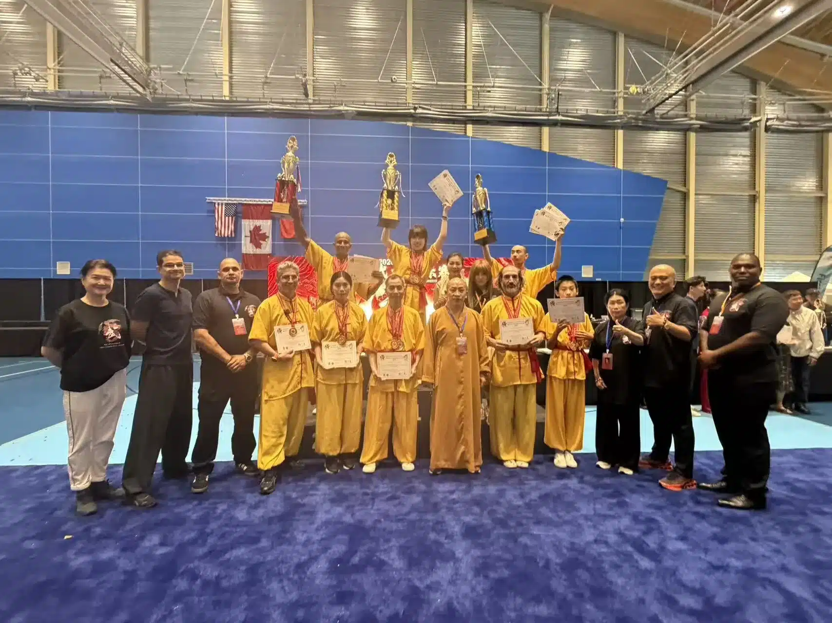 Kung Fu Vancouver team at a 2026 Wushu competition awards presentation
